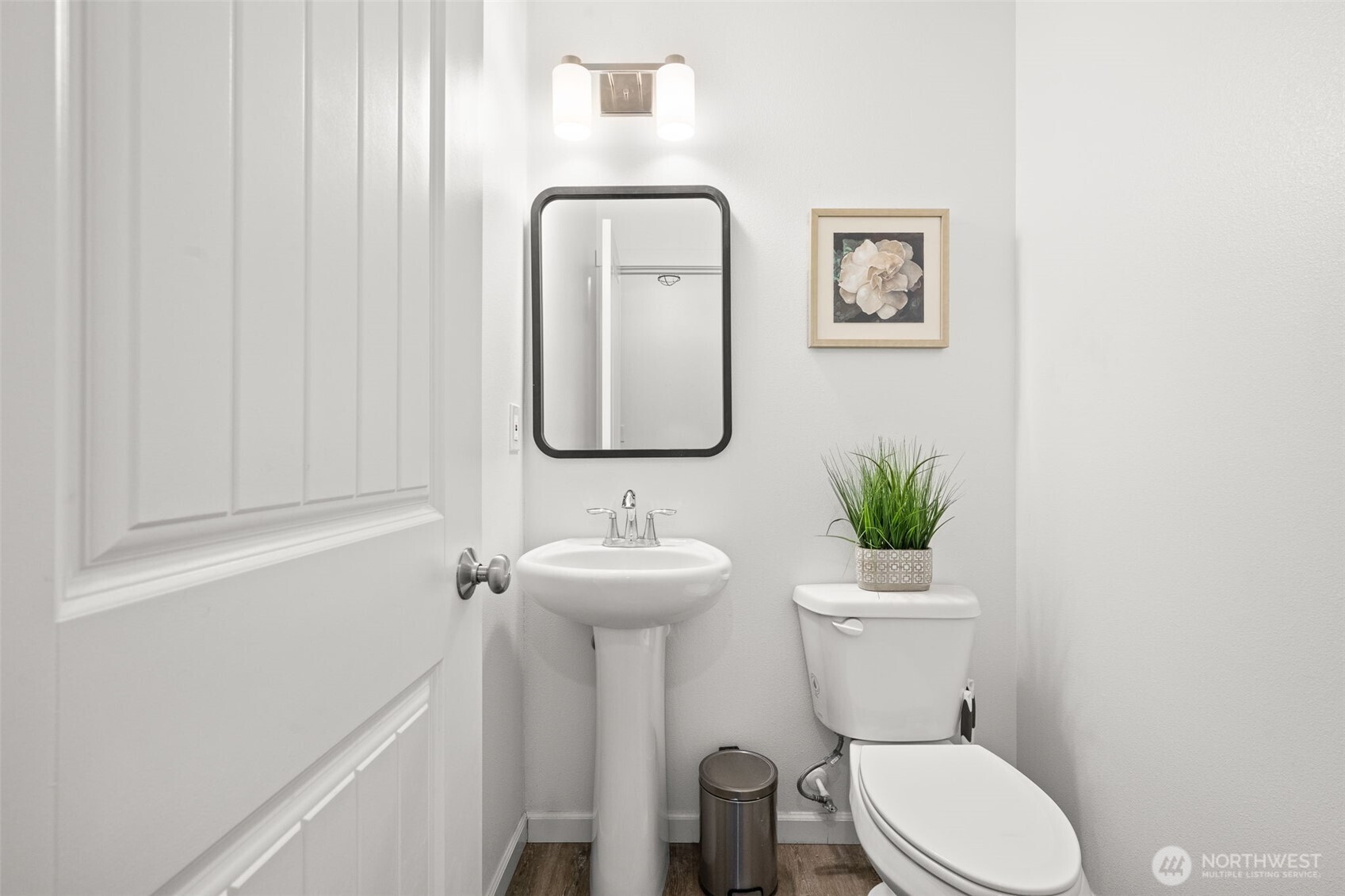 401 East Sunset Ridge Road Union, WA 98592 - Photo 13 of 37 a bathroom with a toilet sink and mirror