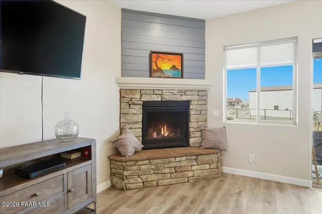 a large kitchen with kitchen island a sink a stove a center island and a refrigerator