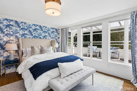 an aerial view of a house with outdoor space