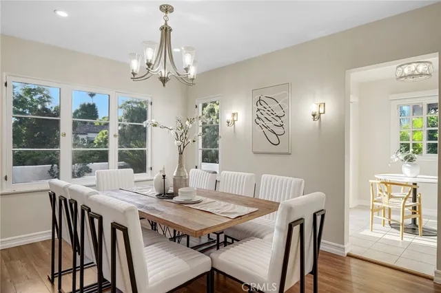 a kitchen with stainless steel appliances granite countertop a stove and a sink
