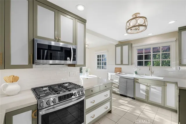 a view of livingroom with washer and dryer