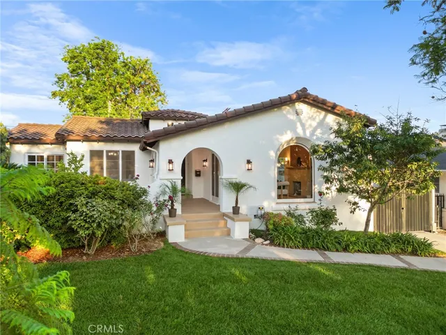 a view of a living room and a livingroom with furniture