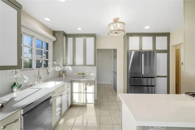 a bathroom with a sink mirror and toilet