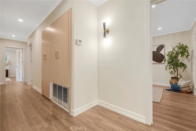a bathroom with a tub sink a mirror and shower