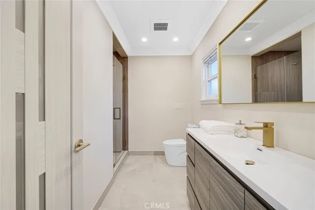 a hallway with storage and utility