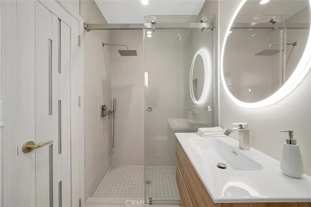 a bedroom with a bed and a table