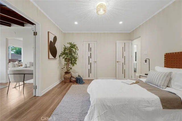 an aerial view of a house with a backyard