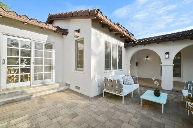 an entryway and livingroom with furniture