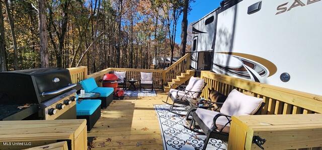 150 Hummingbird Cove Sardis, MS 38666 - Photo 4 of 8 150 Hummingbird Cove. Deck and RV