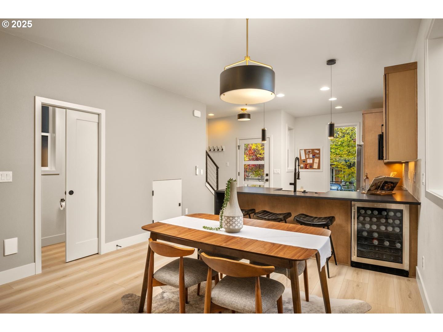 2620 North Kilpatrick Street Portland, OR 97217 - Photo 11 of 37 a room with furniture and a chandelier