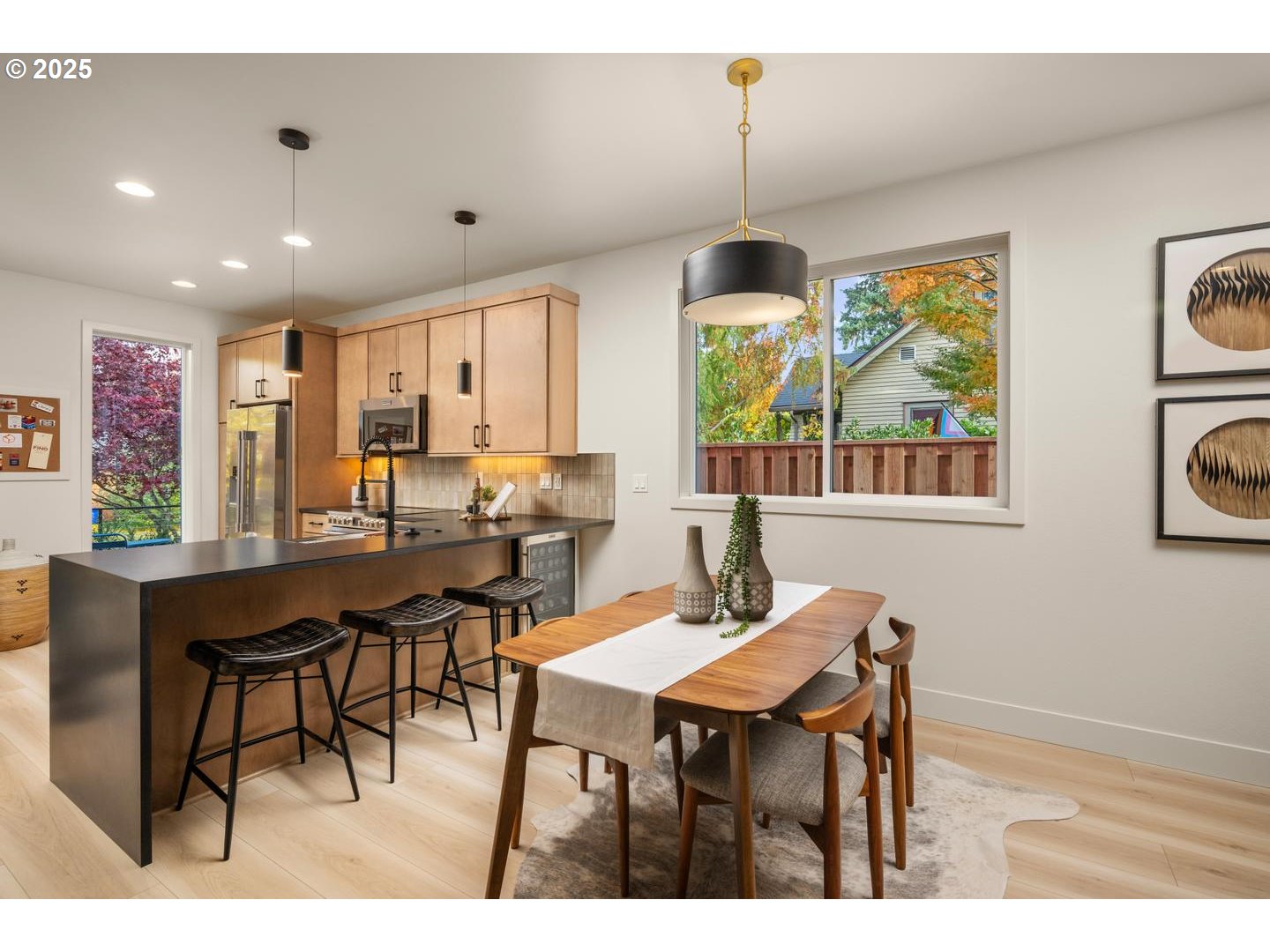 2620 North Kilpatrick Street Portland, OR 97217 - Photo 12 of 37 a view of a dining room with furniture window and outside view