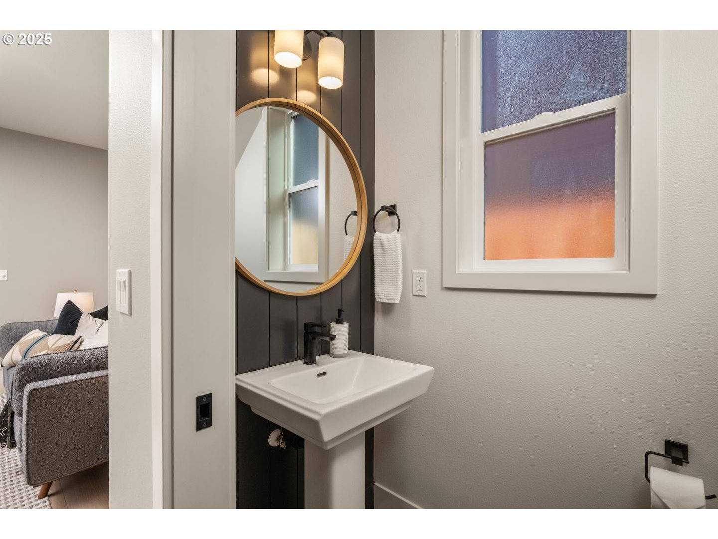 2620 North Kilpatrick Street Portland, OR 97217 - Photo 16 of 37 a bathroom with a sink a mirror and a toilet