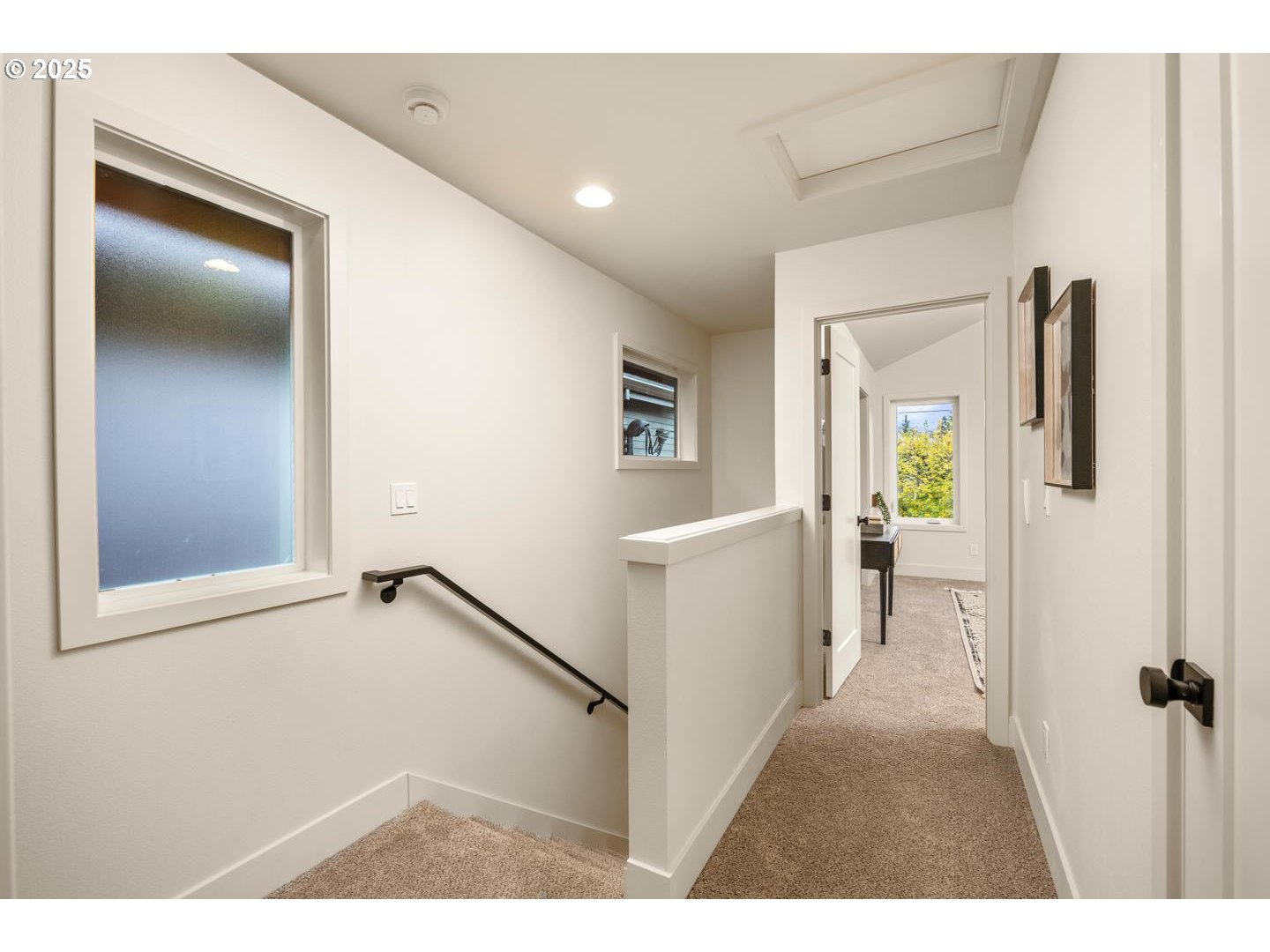 2620 North Kilpatrick Street Portland, OR 97217 - Photo 17 of 37 a view of hallway with furniture and a wooden floor
