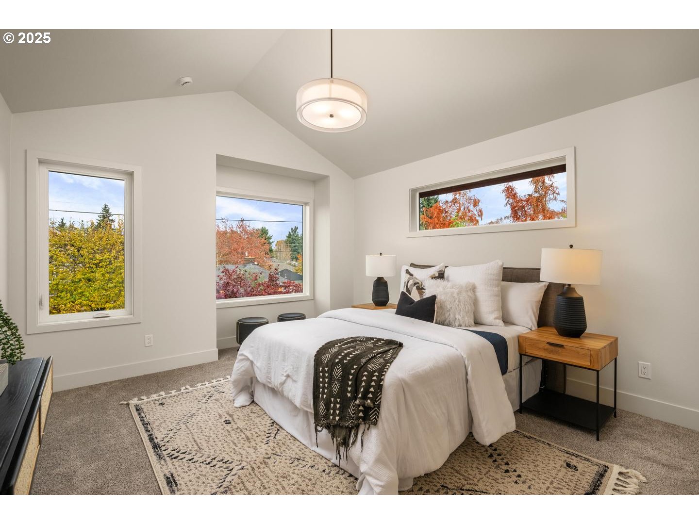 2620 North Kilpatrick Street Portland, OR 97217 - Photo 18 of 37 a bedroom with a bed and a window
