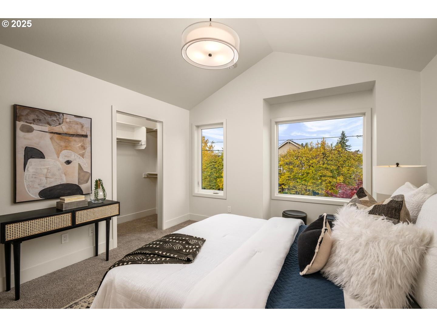 2620 North Kilpatrick Street Portland, OR 97217 - Photo 19 of 37 a bedroom with a bed and a window