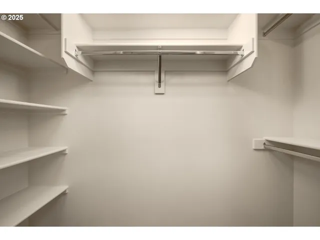 a view of a room with racks on the wall