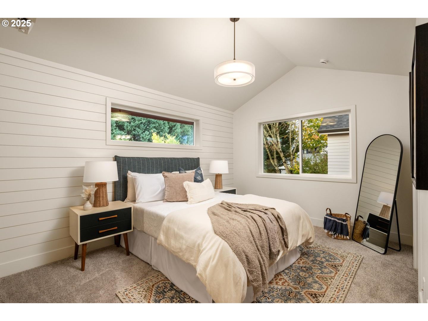2620 North Kilpatrick Street Portland, OR 97217 - Photo 23 of 37 a bedroom with a bed and a window