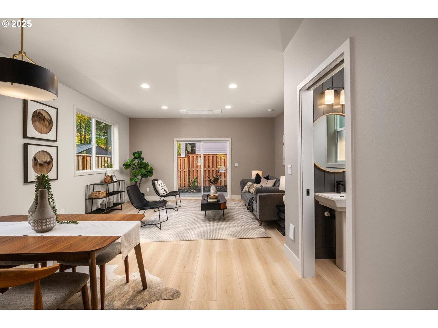 2620 North Kilpatrick Street Portland, OR 97217 - Photo 6 of 37 a living room with furniture and a large window
