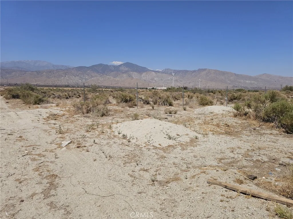 51830 Adele Cabazon, CA 92230 - Photo 3 of 3 a view of a dry yard with mountains in the background