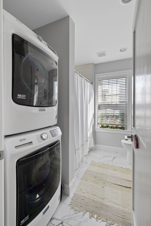 13 Spring Street, Unit 3 Salem, MA 01970 - Photo 20 of 37 a bathroom with a washing machine and dryer