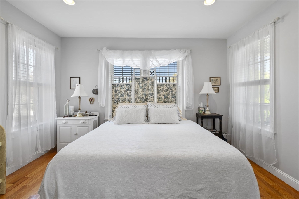 13 Spring Street, Unit 3 Salem, MA 01970 - Photo 25 of 37 a bedroom with a large bed and a window