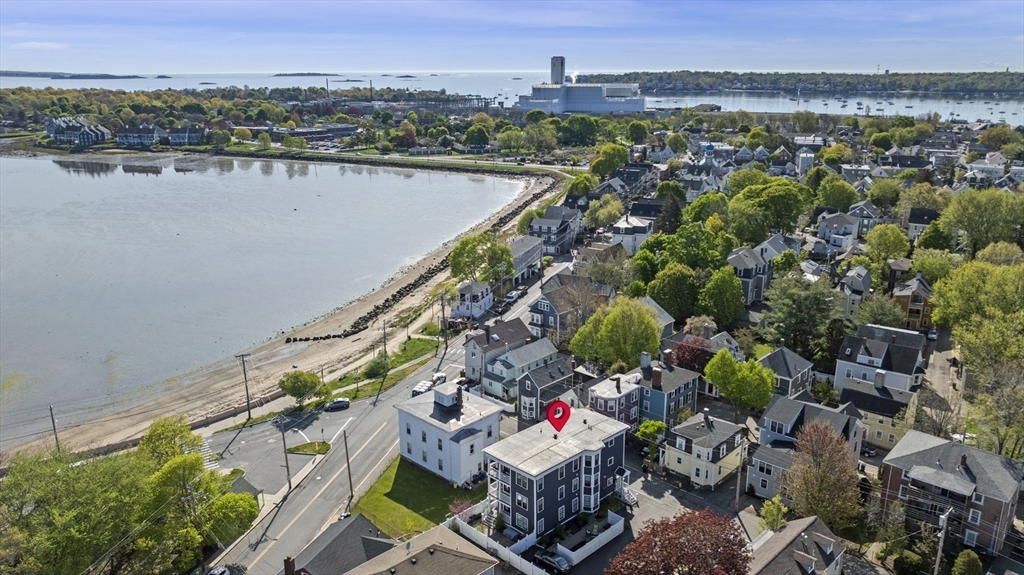 13 Spring Street, Unit 3 Salem, MA 01970 - Photo 3 of 37 an aerial view of a city and lake view