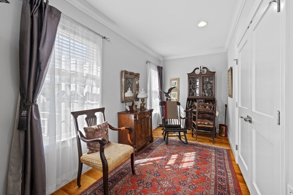13 Spring Street, Unit 3 Salem, MA 01970 - Photo 9 of 37 a living room with furniture and a rug
