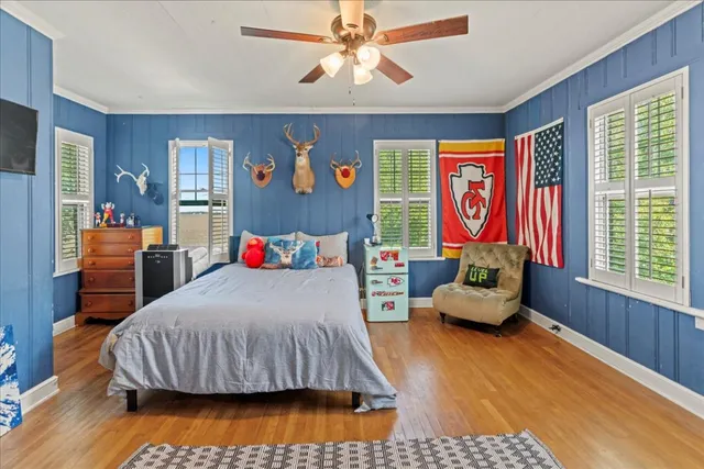 a bed room with a bed and a couch