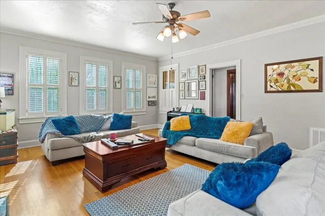 a living room with furniture and a window