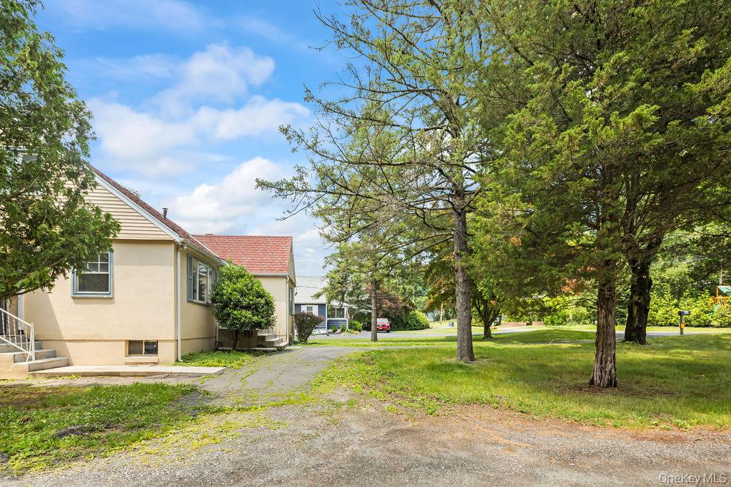 281-283 Old Haverstraw Road Congers, NY 10920 - Photo 40 of 41 a view of a yard with plants and trees