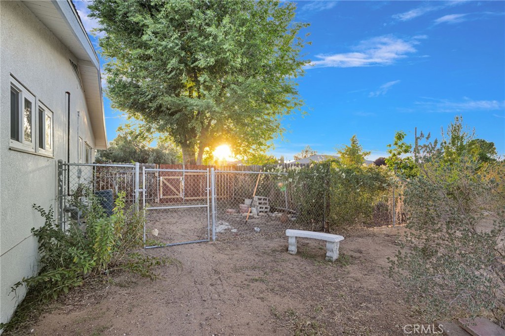 15177 Mendota Road North Apple Valley, CA 92307 - Photo 38 of 50 a view of a backyard