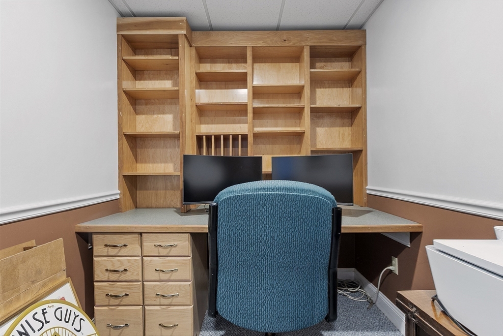 21 High Street Ayer, MA 01432 - Photo 25 of 41 a chair and table in a room