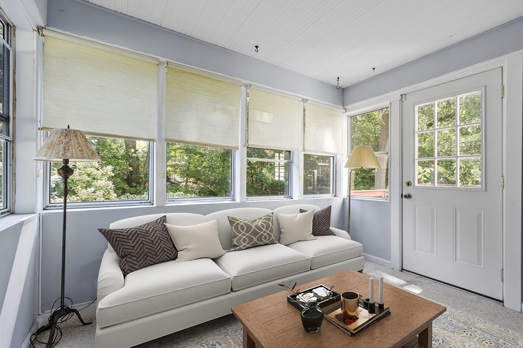 21 High Street Ayer, MA 01432 - Photo 27 of 41 a living room with furniture and a large window