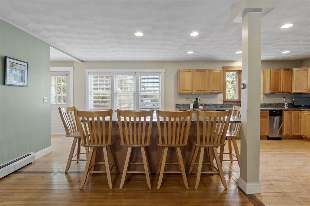 21 High Street Ayer, MA 01432 - Photo 7 of 40 a view of a dining room with furniture and wooden floor