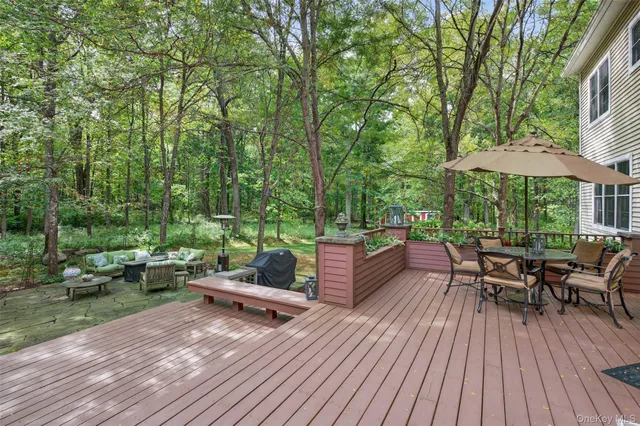 a view of a tables and chairs in a patio