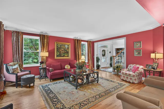 a living room with furniture or couch and a window