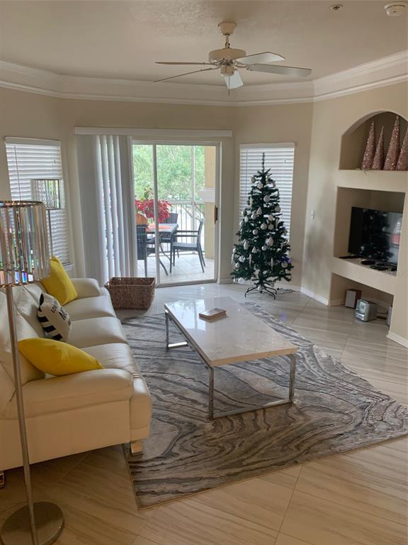 5140 Northridge Road, Unit 204 Sarasota, FL 34238 - Photo 6 of 12 a living room with furniture and a fireplace