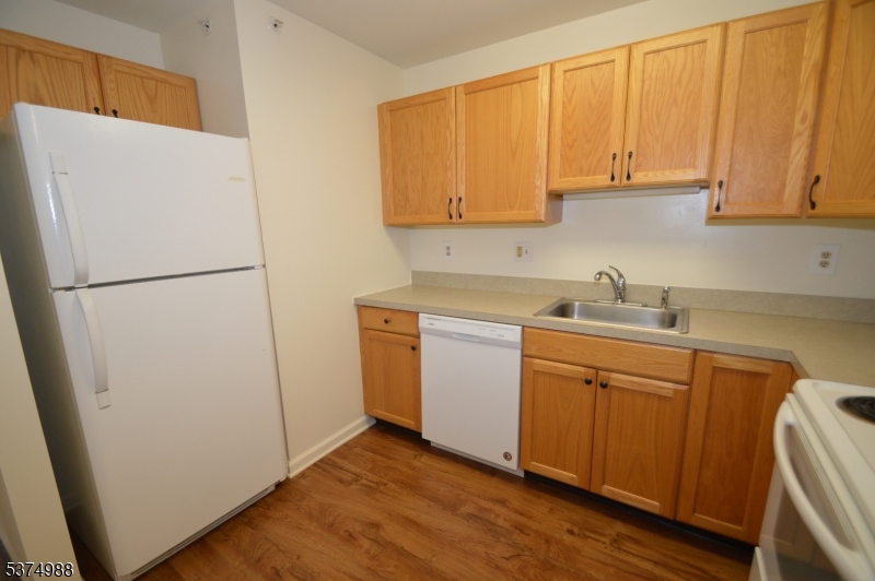 1 Jenny Lind Street, Unit 16 Netcong, NJ 07857 - Photo 11 of 20 a view of a kitchen with sink and refrigerator
