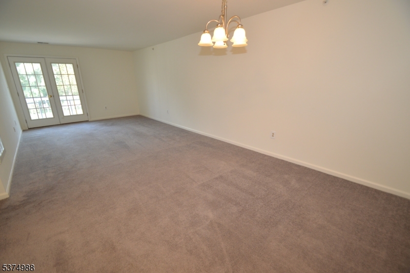 1 Jenny Lind Street, Unit 16 Netcong, NJ 07857 - Photo 15 of 20 wooden floor in an empty room with a window