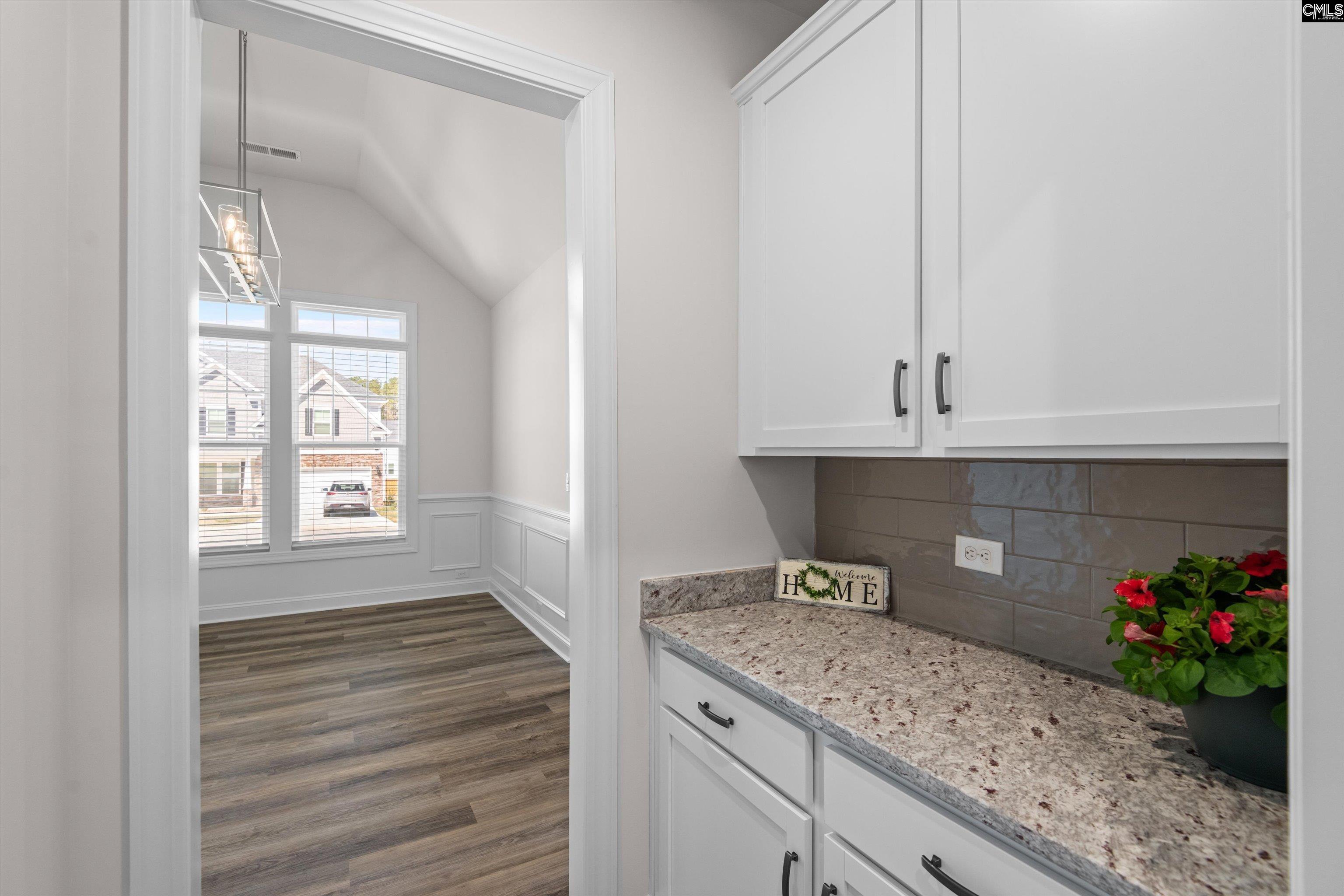 558 Wild Ginger Loop Irmo, SC 29063 - Photo 18 of 42 a kitchen with a sink and cabinets