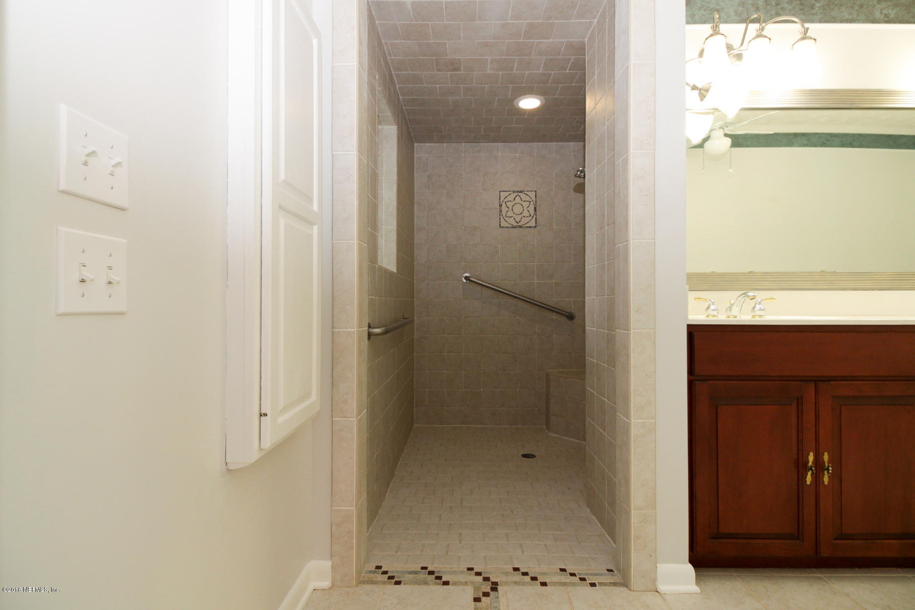 2015 Cornell Road Middleburg, FL 32068 - Photo 17 of 42 a bathroom with a shower and a sink