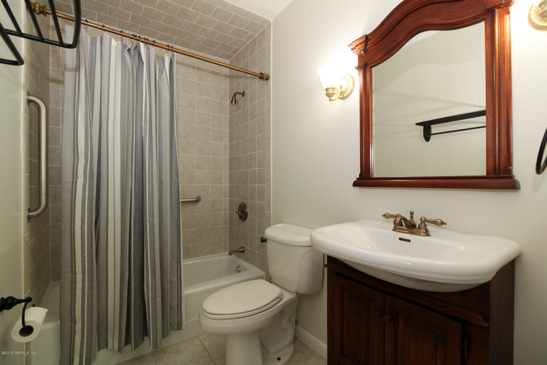 2015 Cornell Road Middleburg, FL 32068 - Photo 24 of 42 a bathroom with a sink toilet and shower