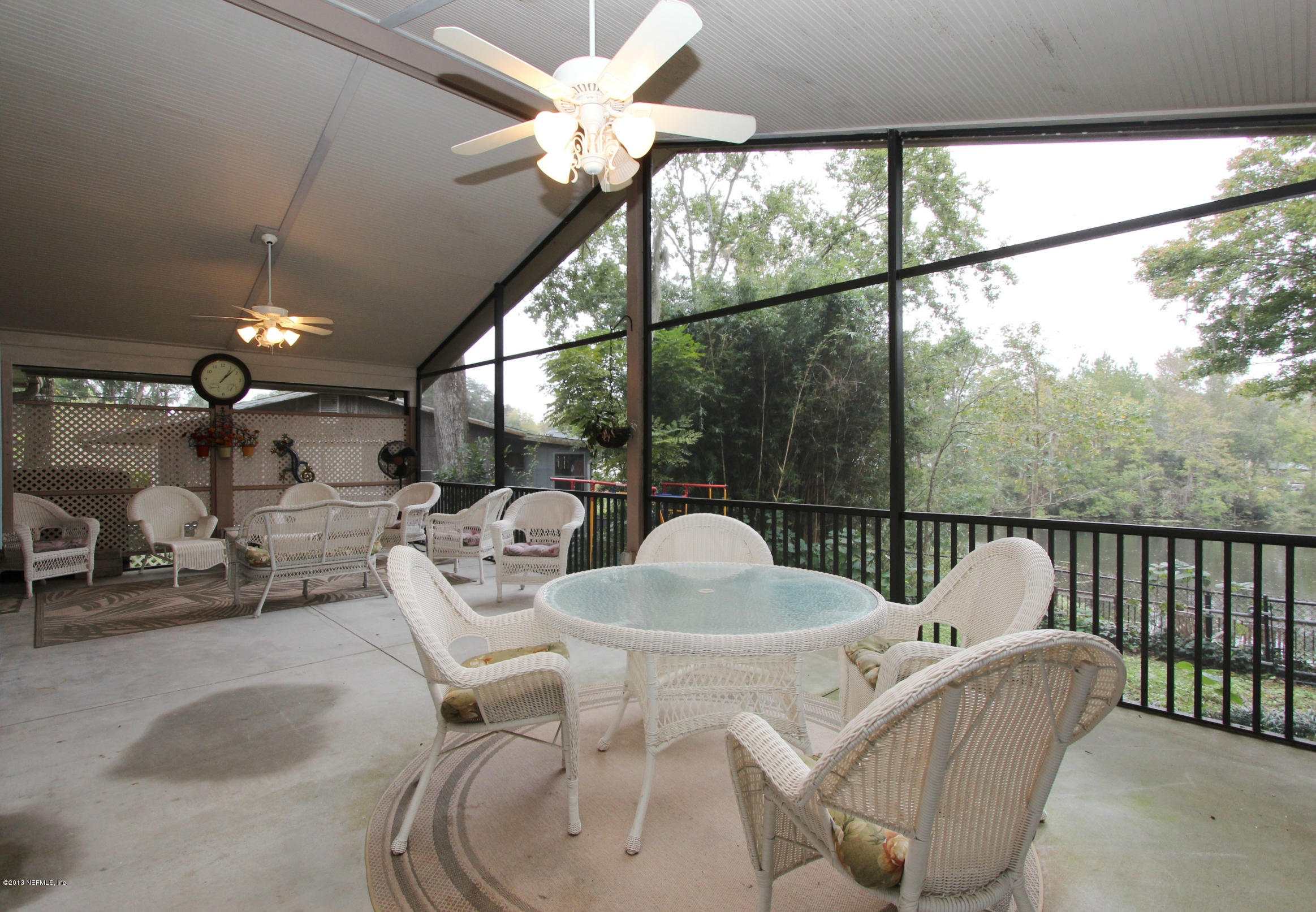 2015 Cornell Road Middleburg, FL 32068 - Photo 25 of 42 a living room with furniture and a large window