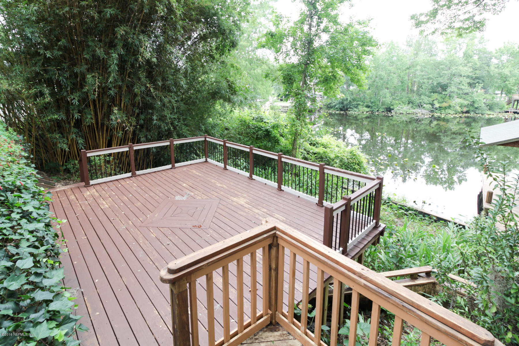 2015 Cornell Road Middleburg, FL 32068 - Photo 29 of 42 a view of balcony with deck and trees