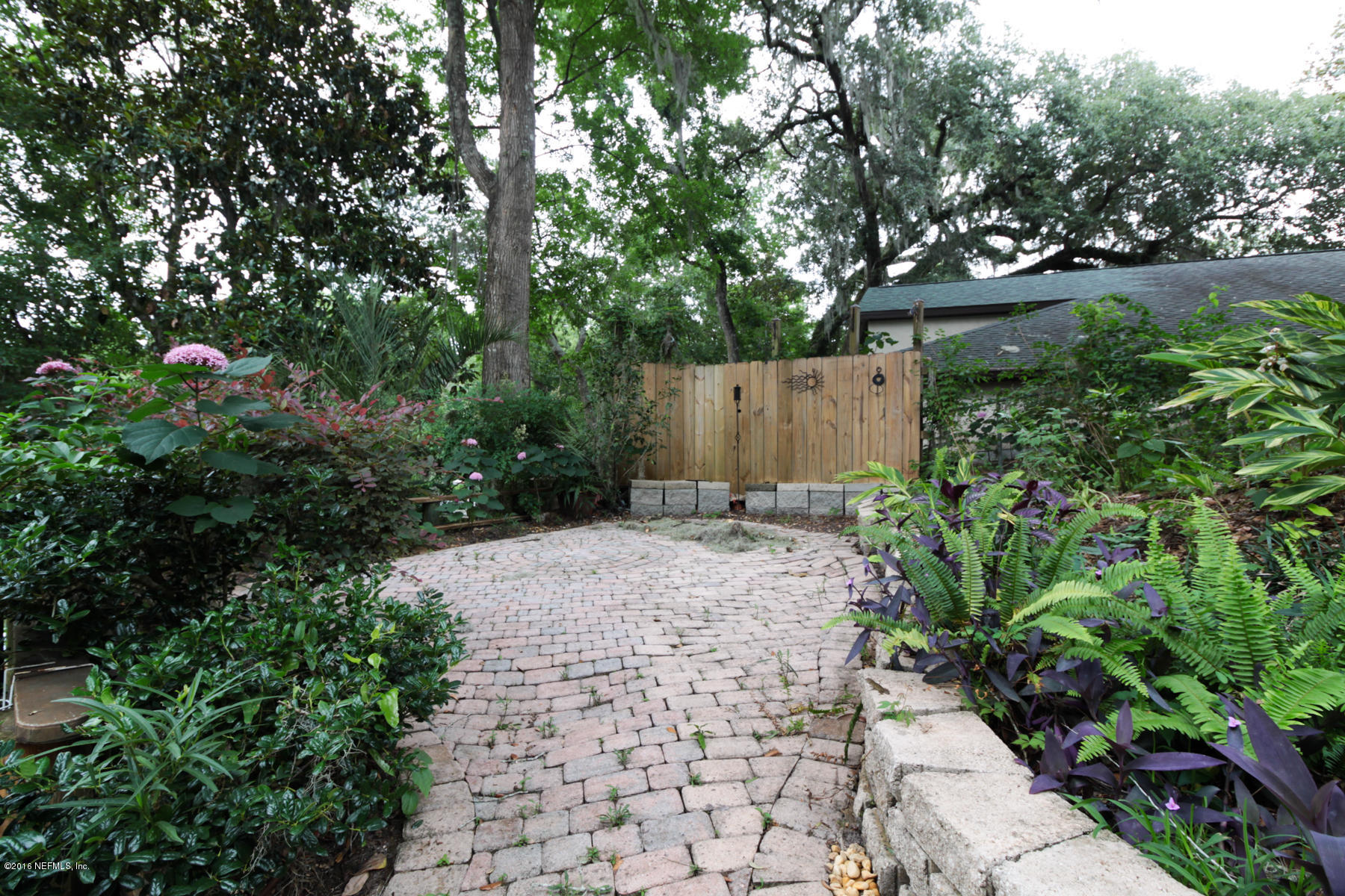 2015 Cornell Road Middleburg, FL 32068 - Photo 33 of 42 a backyard of a house with lots of green space