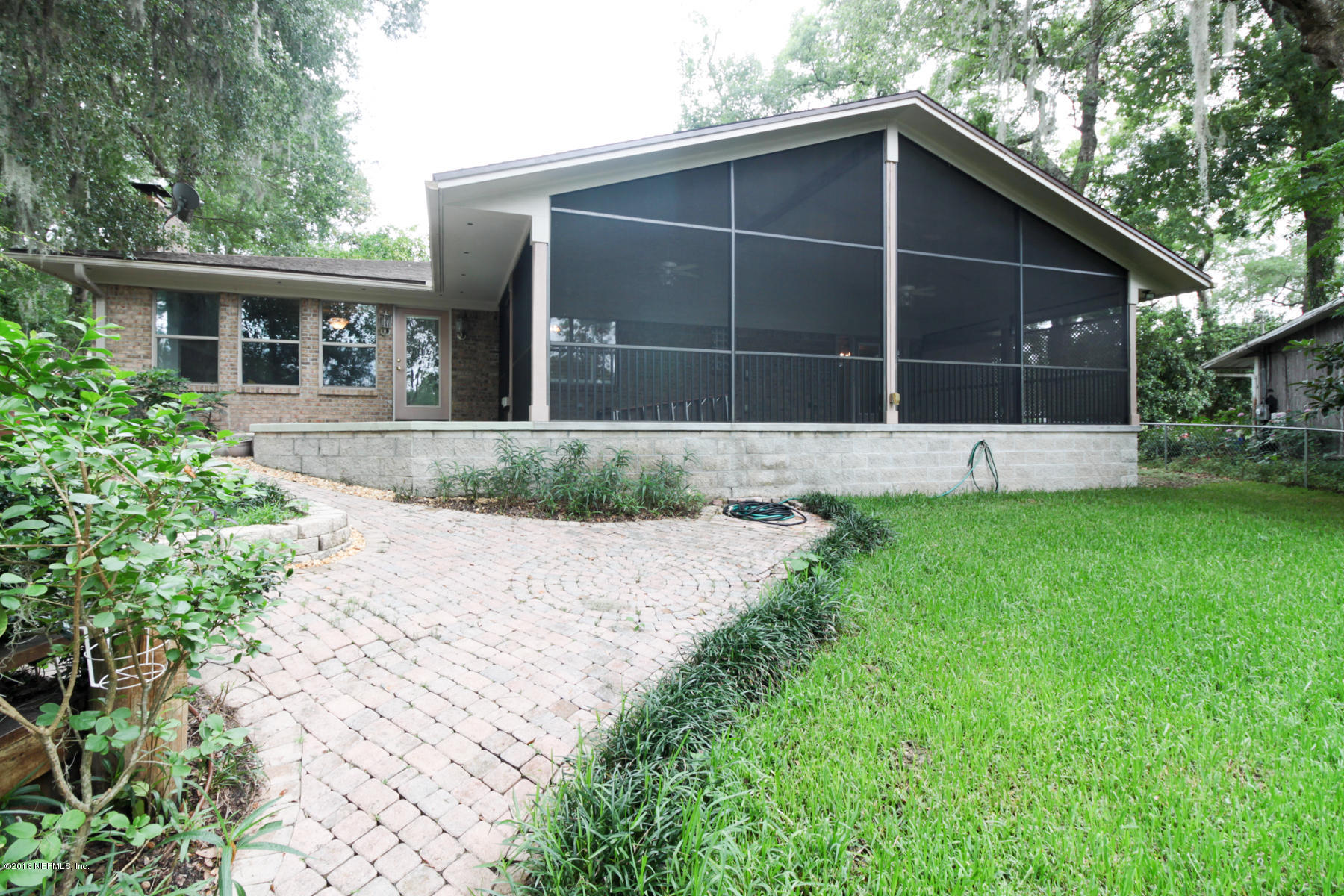 2015 Cornell Road Middleburg, FL 32068 - Photo 38 of 42 a front view of house with yard and green space