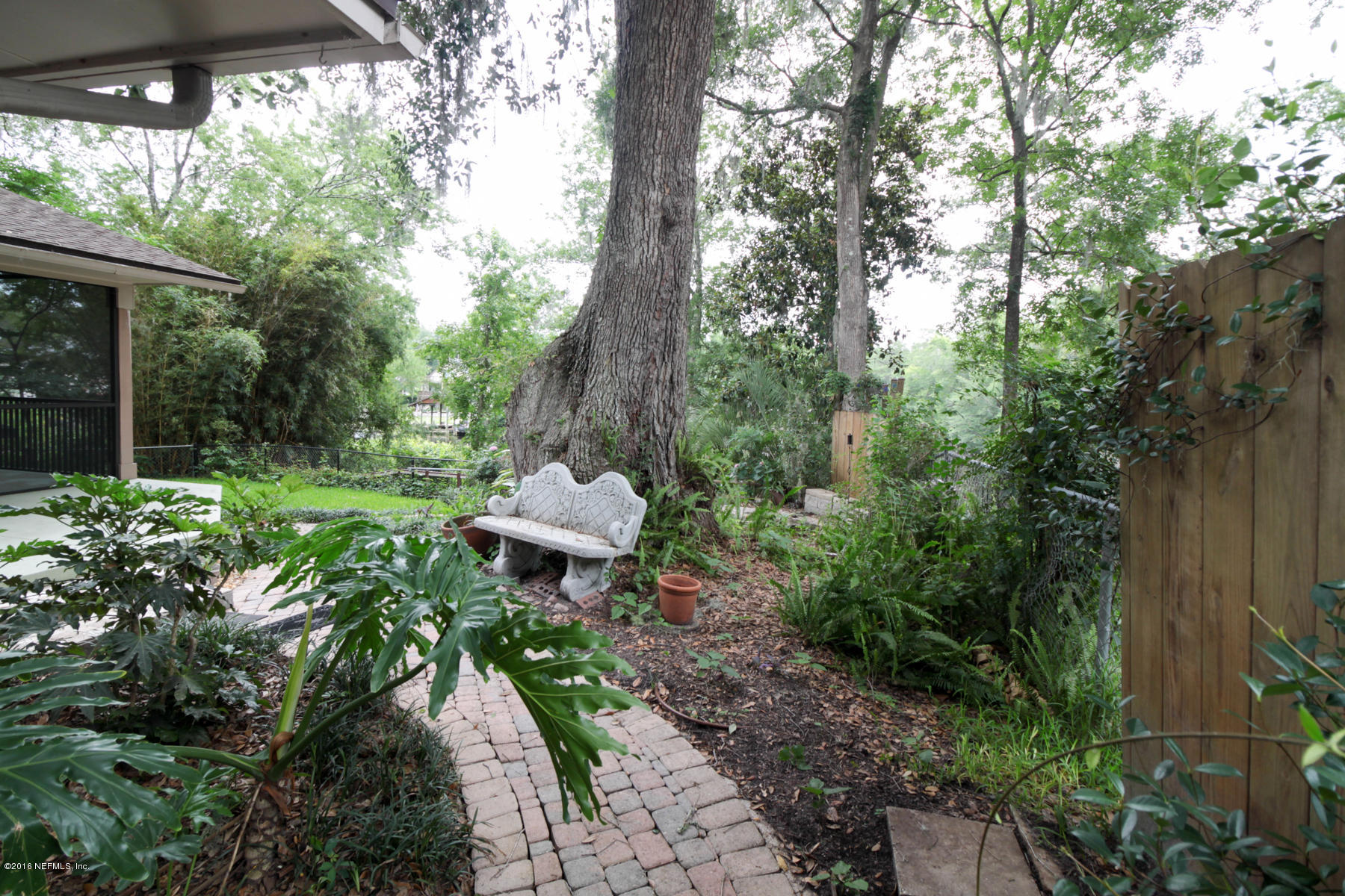 2015 Cornell Road Middleburg, FL 32068 - Photo 40 of 42 a garden view with a seating space