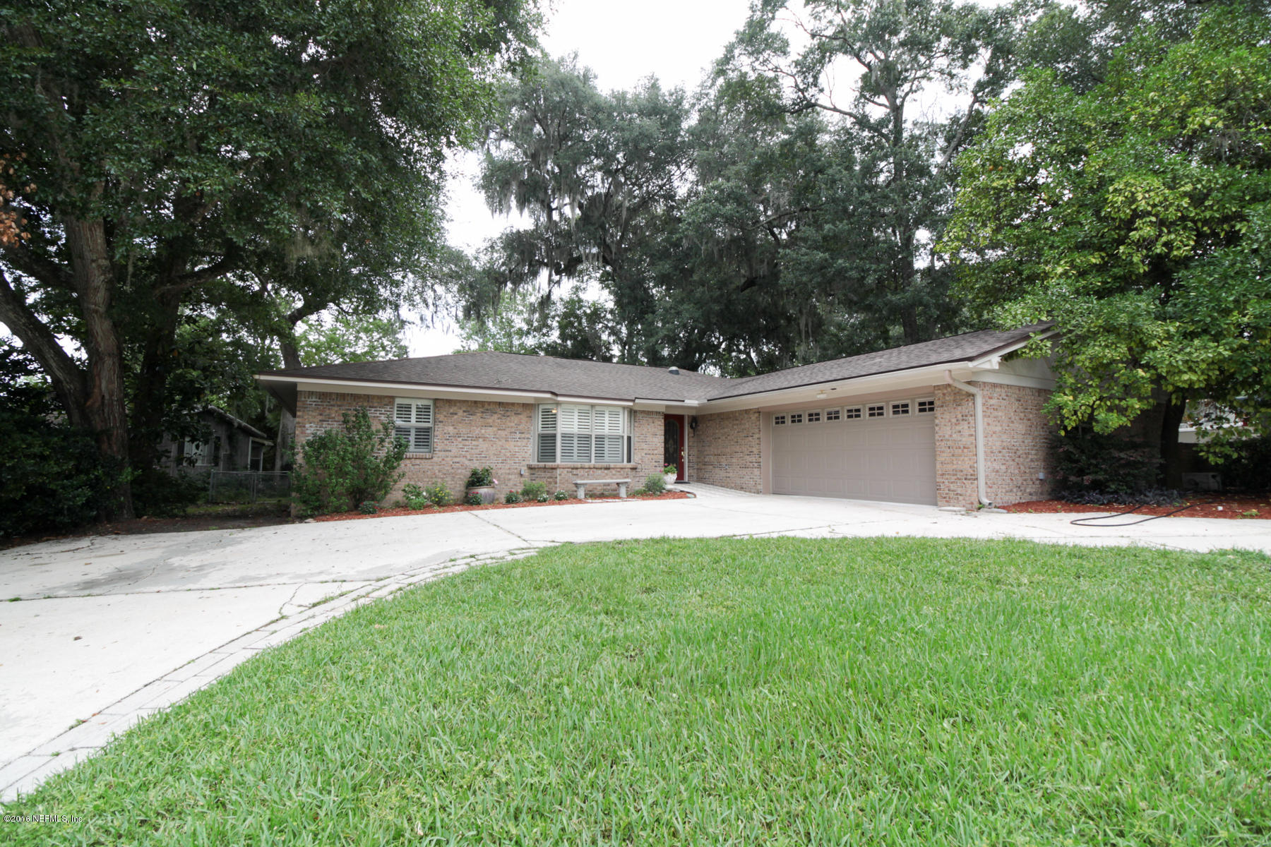 2015 Cornell Road Middleburg, FL 32068 - Photo 41 of 42 a front view of house with yard and trees