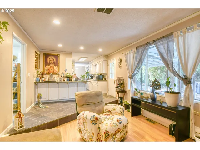 a bathroom with a granite countertop sink mirror and vanity