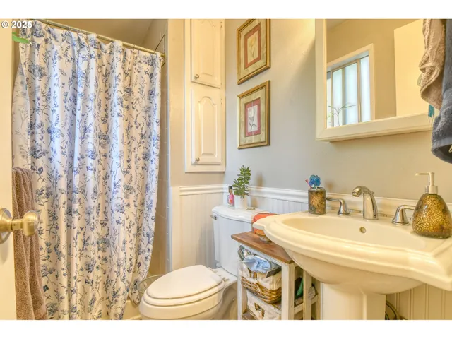a view of a porch with furniture and next to a yard